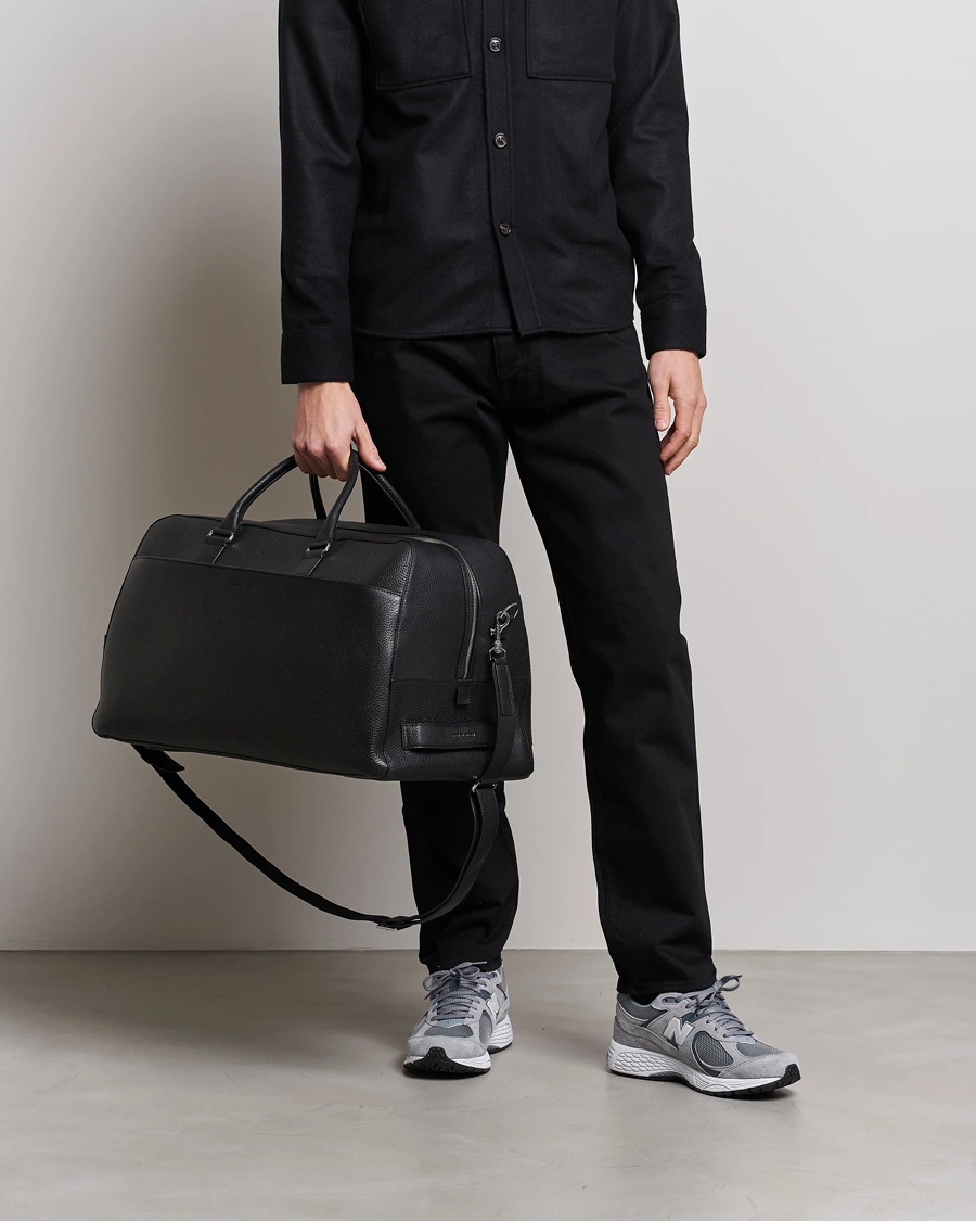 Mies | Asusteet | Tiger of Sweden | Brome Grained Leather Weekendbag Black