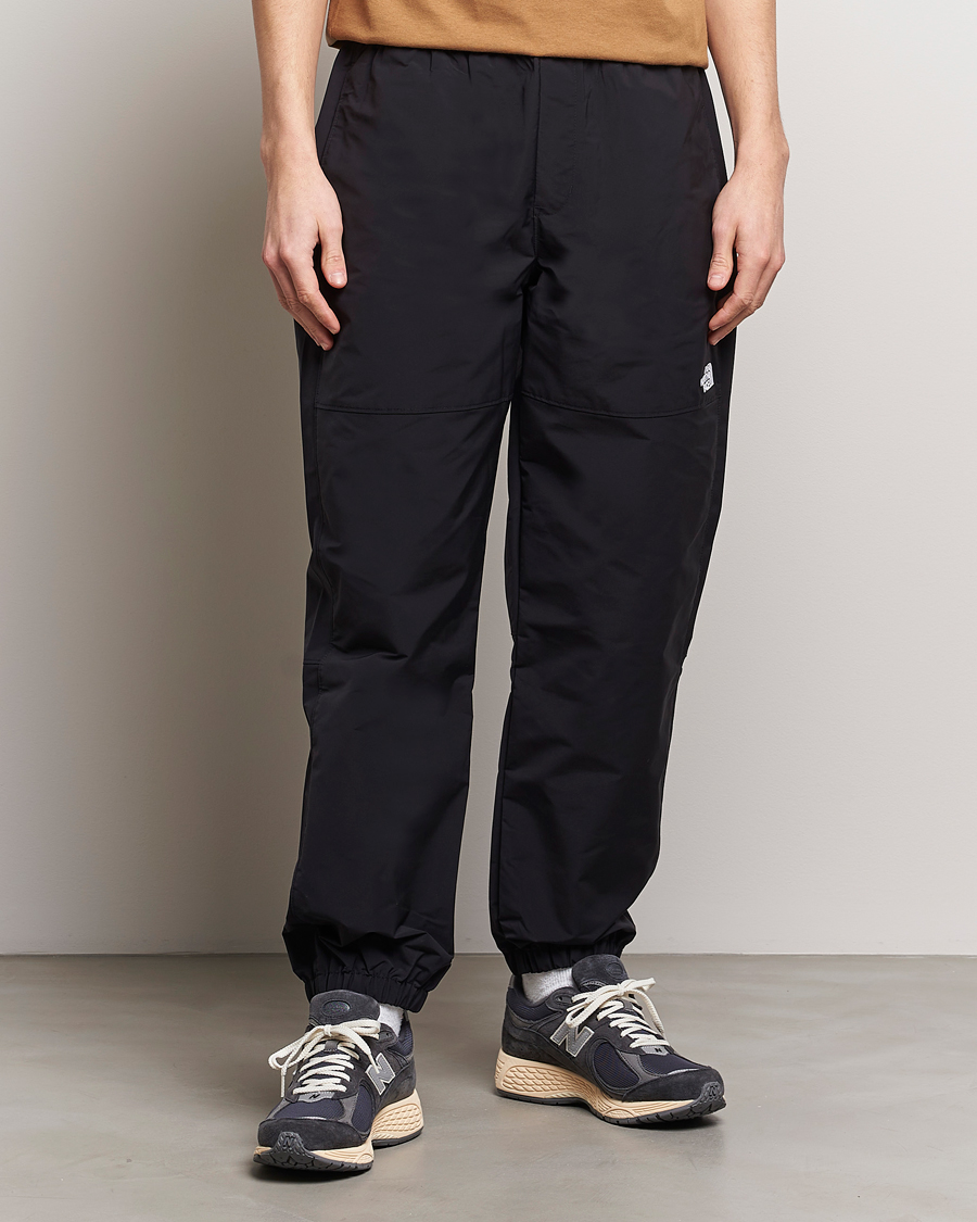 Mies |  | The North Face | Easy Wind Pants Black