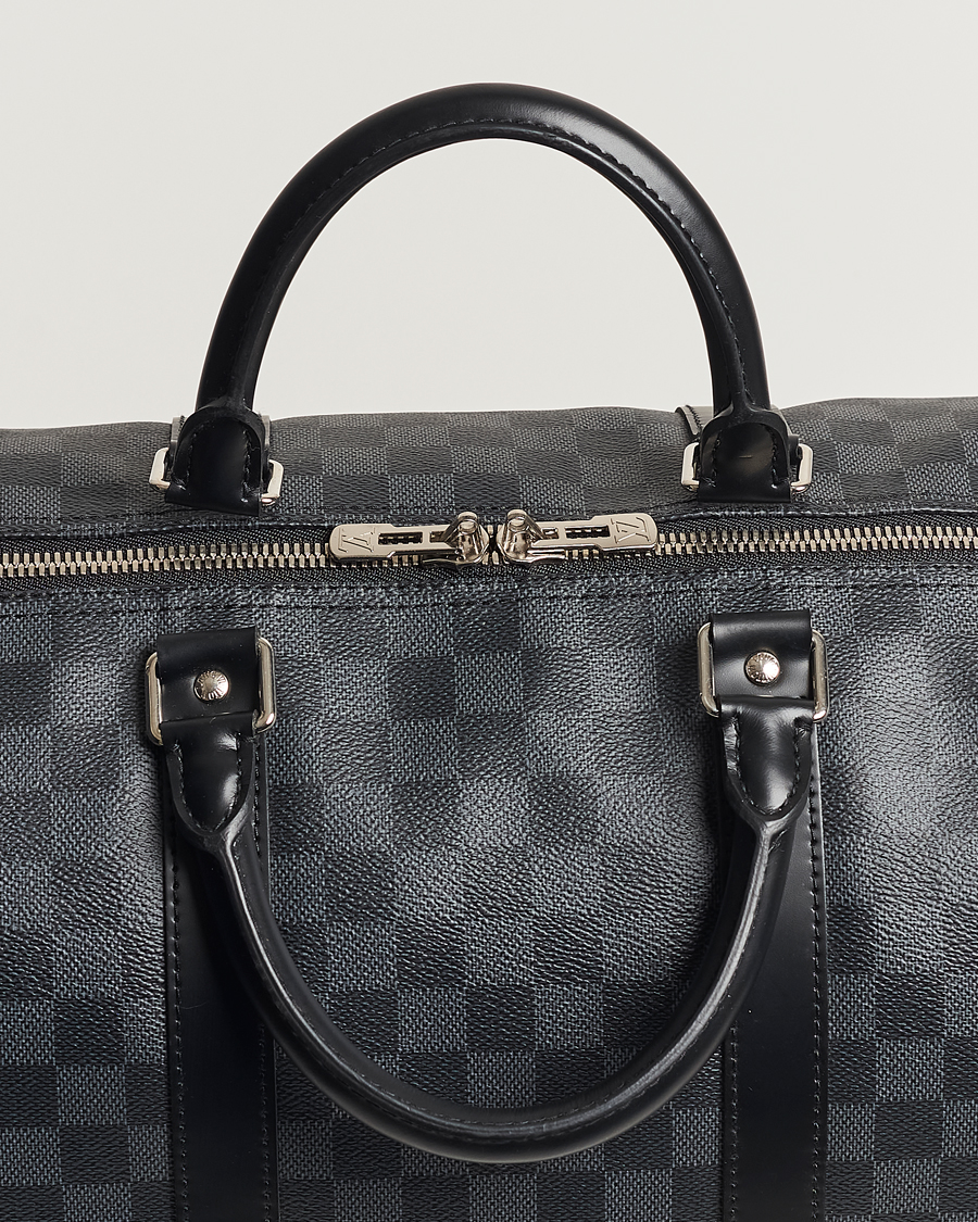 Mies | Louis Vuitton Pre-Owned Keepall Bandoulière 55 Damier Graphite | Louis Vuitton Pre-Owned | Keepall Bandoulière 55 Damier Graphite