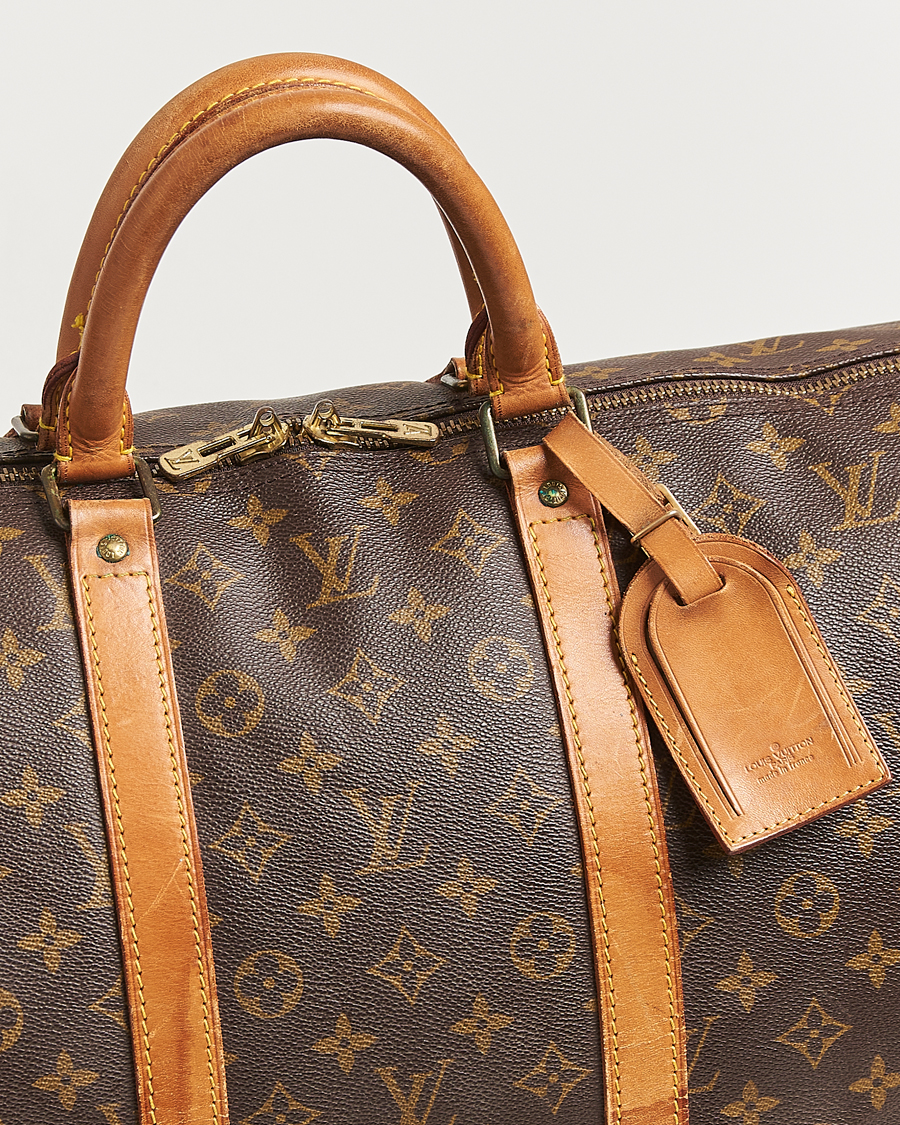 Mies | Louis Vuitton Pre-Owned Keepall Bandoulière 55 Monogram | Louis Vuitton Pre-Owned | Keepall Bandoulière 55 Monogram